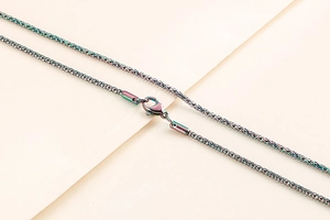 Detail of colorful rainbow plated stainless steel popcorn chain necklace with lobster clasp