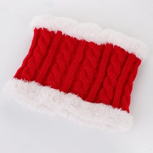 Close-up of red knit infinity scarf with white faux fur trim for winter warmth