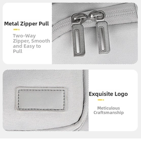 Detail of high-density gray laptop bag with smooth dual metal zippers and stitched leather patch