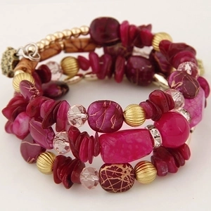Bohemian multilayer wrap bracelet with red turquoise beads and vintage gold accents