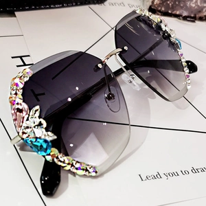 Oversized rimless sunglasses with gradient lenses and luxury colorful rhinestone frame