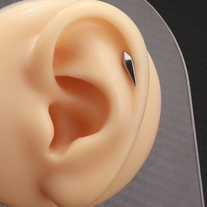 Sleek silver lightning spike earring in stainless steel for minimalist cartilage piercings