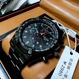 Detail view of a men's black stainless steel chronograph watch in a leather gift box