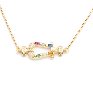 Bracciale a ferro di cavallo dorato con zirconi colorati, catena veneziana