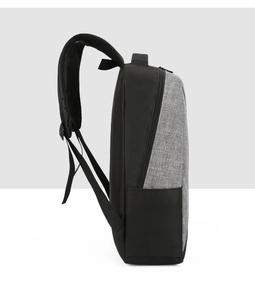 Detail view of the durable nylon backpack side featuring mesh pocket and zipper
