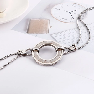 Double-layered silver round necklace with marble pattern inlay and sparkling crystals