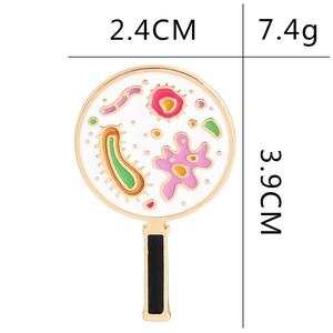 Cartoon enamel microbe brooch under magnifying glass view with size 2.4cm by 3.9cm