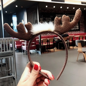 Close-up of brown plush reindeer antler headband for Christmas festive party costumes