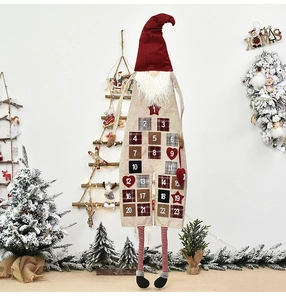 Detail of Christmas gnome advent calendar with 24 small pockets for festive countdown