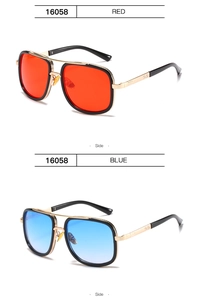 Side view of retro oversized metal sunglasses with red and gradient blue lenses