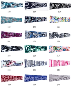 Collection of 18 wide printed yoga headbands in diverse bohemian and floral patterns