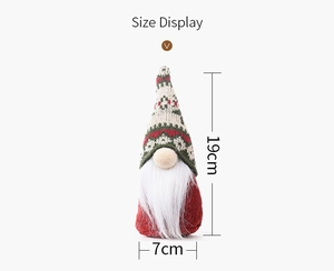 Afmetingen van een kerstkabouter met sneeuwvlok gebreide muts, 19 cm bij 7 cm groot