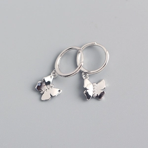 Detailed view of 925 sterling silver butterfly hoop earrings with polished finish