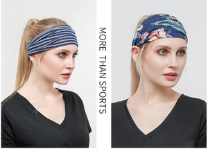 Detail showing blue wave and tropical floral print wide elastic yoga headbands for women