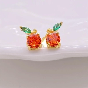 S925 silver orange stud earrings with vibrant orange stones and green leaf details