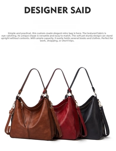 Detailed view of large retro tote bags in brown, red, and black with textured finish