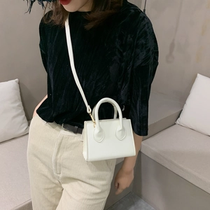 Minimalist white leather mini square bag with crossbody strap for summer daily wear