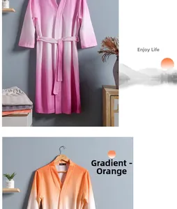 Detail view of pink and orange gradient waffle weave robes for couples with belts