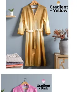 Detail of soft waffle knit texture and yellow gradient effect on the long-sleeved bathrobe