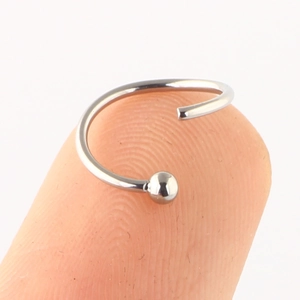 Minimalist silver titanium steel C-shaped nose ring held on finger showing small size