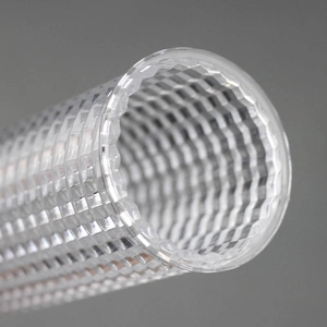 Macro view of transparent velvet display stand tube with textured diamond pattern finish