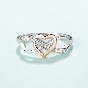 Silver and rose gold infinity heart ring with pave zircon accents for women