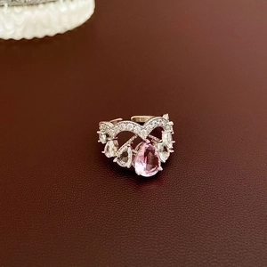 Silver heart zircon ring with pink pear-shaped stone and adjustable open band