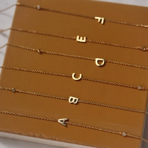 18K gold plated stainless steel letter necklace with diamond accents from A to F