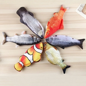 Detailed top view of six colorful plush fish cat toys on a light wooden background