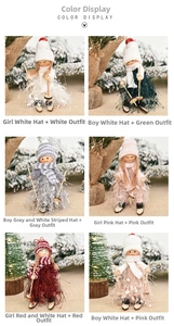 Close-up of six creative Christmas dolls with wooden skis and fuzzy fringe coats