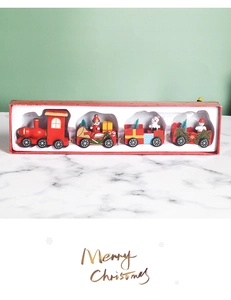Detail view of 4-section wooden Christmas train set in a red festive gift box
