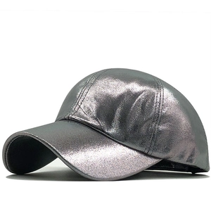 Detailed close-up of metallic silver PU leather baseball cap showing texture and sheen