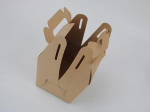 Detailed view of brown kraft paper gift box with handle and secure side closure mechanism