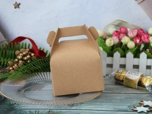 Detailed view of brown kraft paper gift box with handle for candy and favors