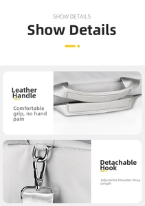 Detail of durable gray fabric laptop bag with leather handle and metal strap buckle