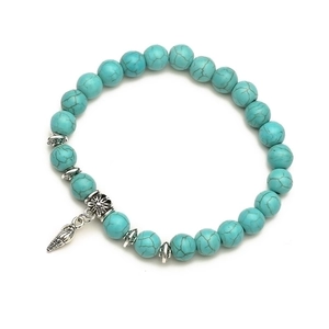 Vintage turquoise bead bracelet set with silver conch charm and engraved spacers