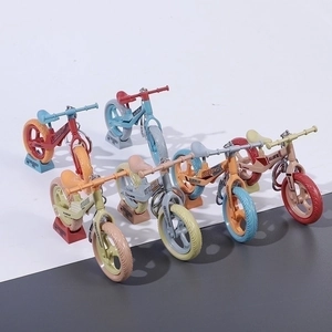 Miniature speed bicycle model keychains in five vibrant colors with triangle display stands