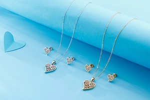 Ensembles de bijoux en forme de cœur or et argent avec motifs ajourés en spirale