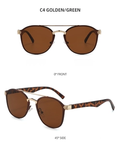 Detail view of double bridge gold metal sunglasses with stylish leopard print temples
