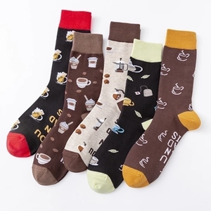 Five pack of cotton crew socks featuring coffee and tea themed patterns in earth tones