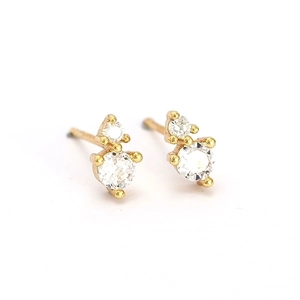 Elegant 925 silver double zirconia stud earrings in gold with a minimalist sparkly design