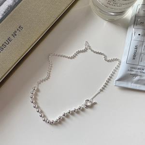 Detailed close-up of 925 sterling silver ball chain necklace with toggle OT clasp closure