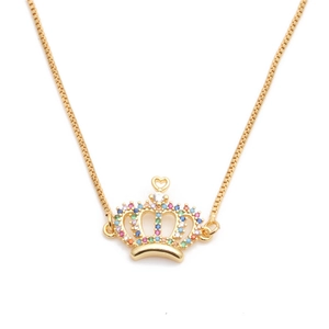 Golden crown pendant necklace with colorful zircons and heart cutout on white background
