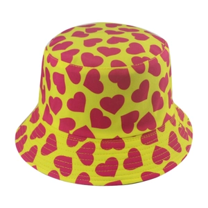 Casual yellow bucket hat with pink heart patterns for summer sun protection and stylish beach wear