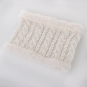 Detailed view of cream white cable-knit winter neck warmer with soft faux fur trim edges