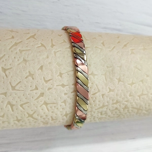 Adjustable magnetic twisted copper bracelet for women in tri-color gold and silver finish