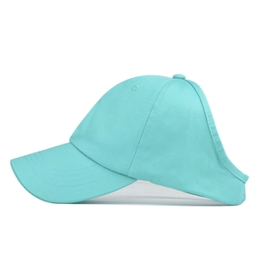 Detail view of mint green ponytail baseball cap showing rear opening for high hair buns