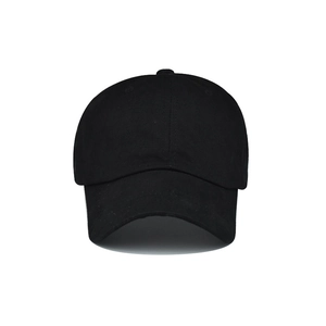 Detail view of the black cotton twill fabric and six-panel stitching on the ponytail cap