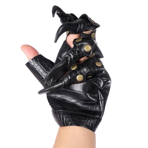 Detail of black faux crocodile leather dragon claw gloves with bronze rivets for cosplay