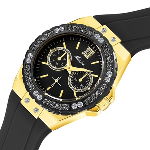 Detail of luxury rhinestone bezel and black silicone strap on gold-toned quartz watch